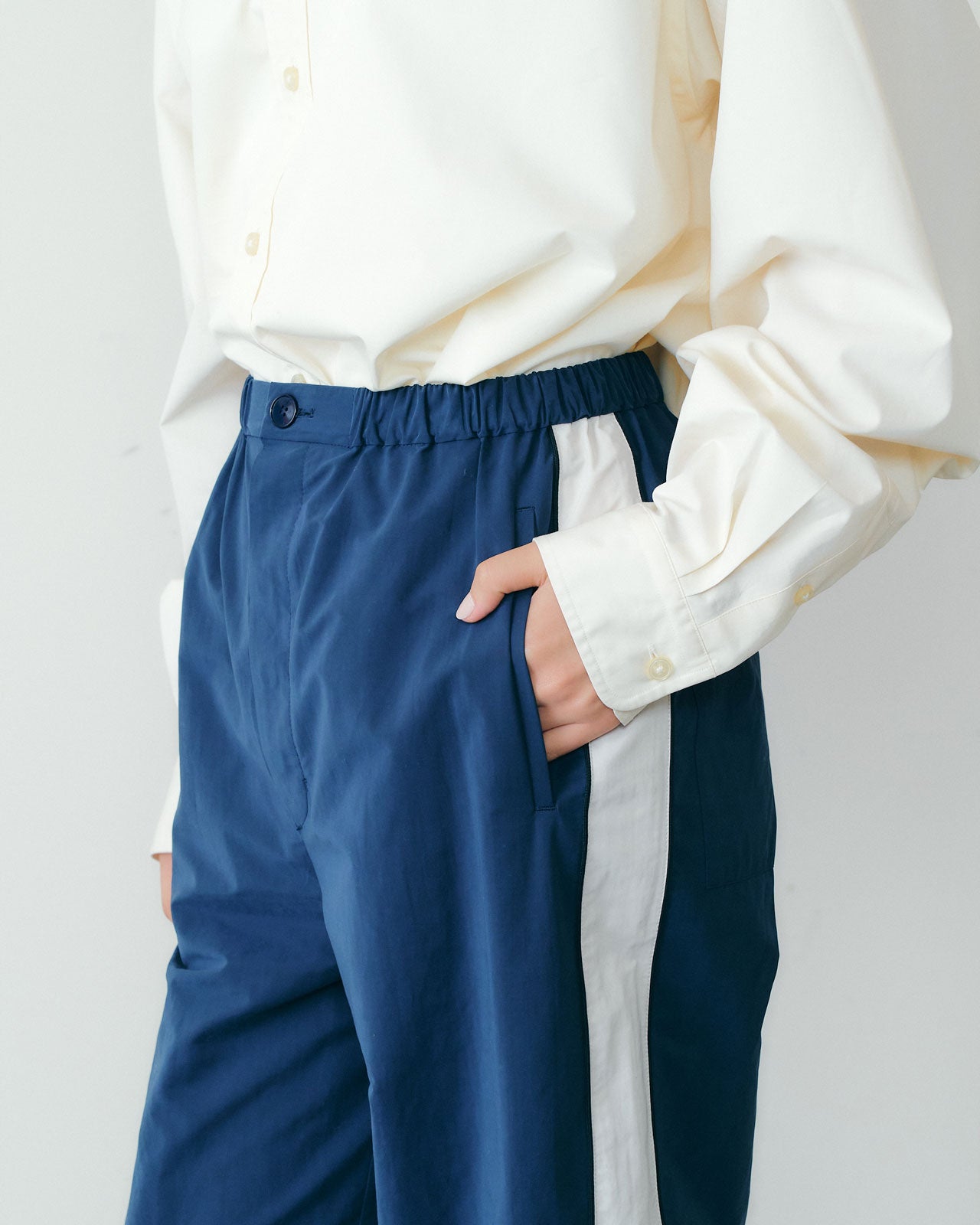 【9月中旬入荷予定】BICOLOR TRACK PANTS